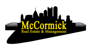 McCormick Real Estate Logo